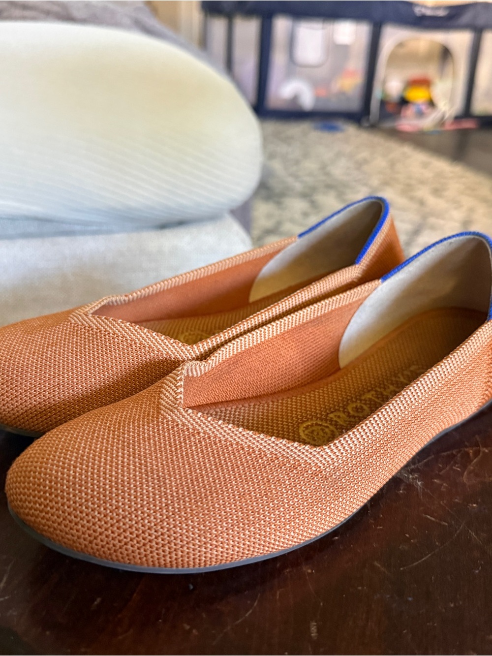 Rothy’s Knit Slip-On Flats in Rust Orange